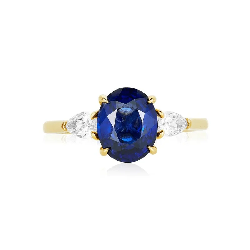 Women's rings fine-style-Oval Cut Sapphire with Pear Cut Diamond Side Stones