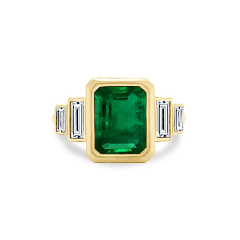 Women's rings contemporary-elegance-Bezel Set Emerald Cut Emerald with Double Baguette Cut Diamond Side Stones